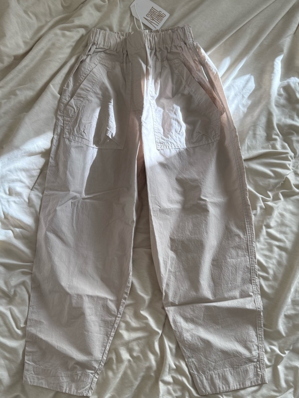 NEW A SHIRT THING Kamryn Parachute High Waisted Tapered Pant in Sand